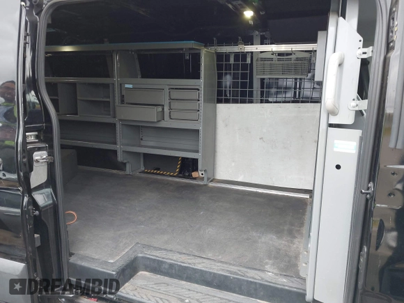 2017 Ford Transit with VIN 1FTYR2YM2HKB57718, listed as a IAAI auction lot 42000328 with 59,338 mi miles and . Bid and sale history available at DreamBid. Image 8.