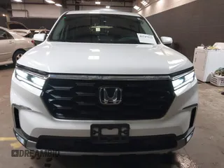 2023 Honda Pilot EX-L z VIN 5FNYG1H5XPB043275, wystawiony jako IAAI lot #41747522 z przebiegiem 18 865 mil mil oraz . Historia ofert i sprzedaży dostępna na DreamBid. Obrazek 12.
