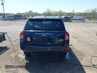 2014 Jeep Compass Latitude with VIN 1C4NJCEB2ED883243, listed as a IAAI auction lot 41989007 with 138,192 mi miles. Bid and sale history available at carsss.com. Image 17.