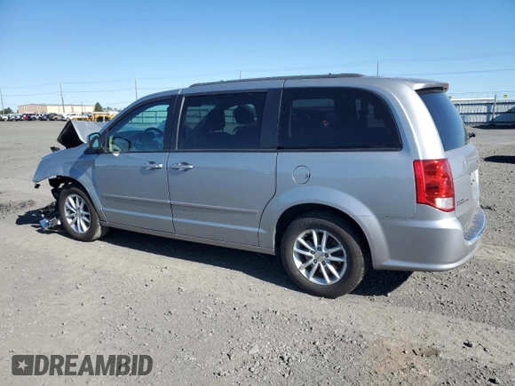 2014 Dodge Grand Caravan SXT with VIN 2C4RDGCG4ER478657, listed as a Copart auction lot 55691085 with 139,681 mi miles and Salvage Title. Bid and sale history available at DreamBid. Image 2.