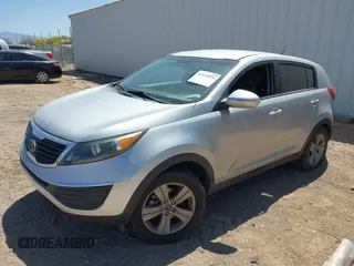2012 Kia Sportage LX with VIN KNDPB3A27C7326884, listed as a IAAI auction lot 42010016 with 112,797 mi miles. Bid and sale history available at carsss.com. Image 2.