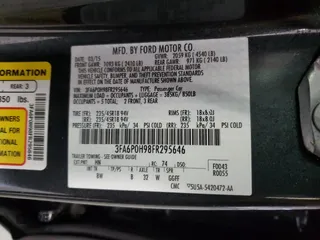2015 Ford Fusion SE z VIN 3FA6P0H98FR295646, wystawiony jako Copart lot #57055105 z przebiegiem 121 515 mil mil oraz Szkoda całkowita • Salvage title. Historia ofert i sprzedaży dostępna na DreamBid. Obrazek 12.