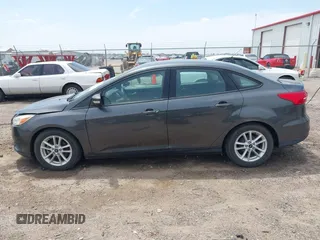 2016 Ford Focus SE with VIN 1FADP3F21GL387227, listed as a IAAI auction lot 42438650 with 59,969 mi miles and . Bid and sale history available at DreamBid. Image 14.