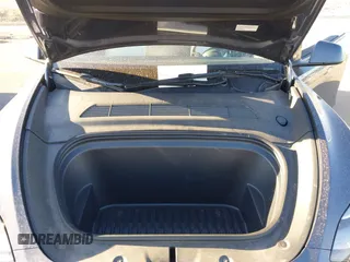 2023 Tesla Model Y Long Range with VIN 7SAYGAEEXPF714760, listed as a IAAI auction lot 41748398 with 49,802 mi miles and . Bid and sale history available at DreamBid. Image 10.