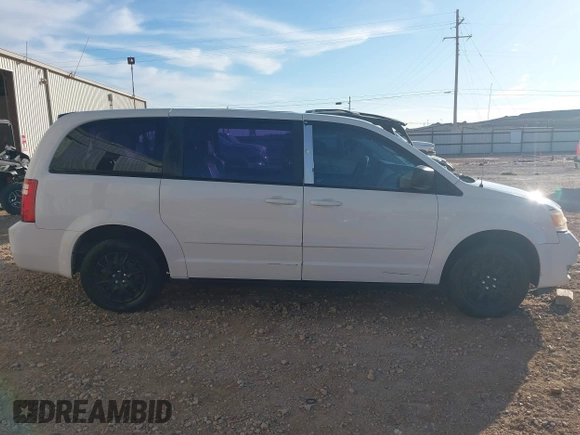 2010 Dodge Grand Caravan SE with VIN 2D4RN4DE8AR402655, listed as a IAAI auction lot 41883296 with 245,961 mi miles and . Bid and sale history available at DreamBid. Image 13.