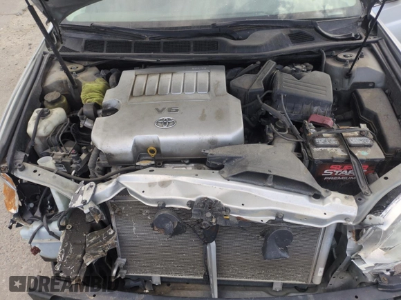 2007 Toyota Avalon XL z VIN 4T1BK36B17U195702, wystawiony jako Copart lot #58081355 z przebiegiem Nie podano mil oraz Szkoda całkowita • Salvage title. Historia ofert i sprzedaży dostępna na DreamBid. Obrazek 11.