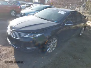 2015 Lincoln MKZ z VIN 3LN6L2GK4FR621332, wystawiony jako IAAI lot #41605753 z przebiegiem 101 686 mil mil oraz . Historia ofert i sprzedaży dostępna na DreamBid. Obrazek 2.