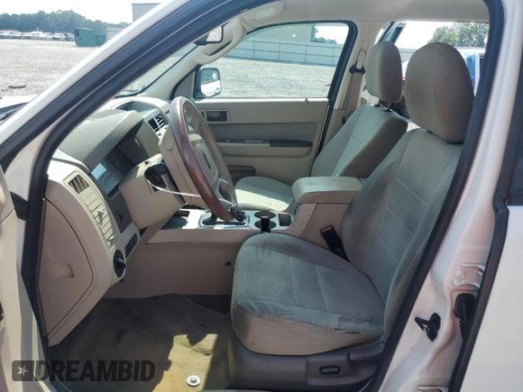 2012 Ford Escape XLT with VIN 1FMCU9D73CKC29497, listed as a Copart auction lot 63211965 with 142,134 mi miles and Salvage title. Bid and sale history available at DreamBid. Image 7.