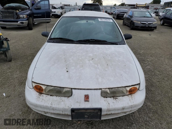 2001 Saturn SL with VIN 1G8ZF52891Z237485, listed as a Copart auction lot 76174574 with 130,525 mi miles and Salvage title. Bid and sale history available at DreamBid. Image 5.