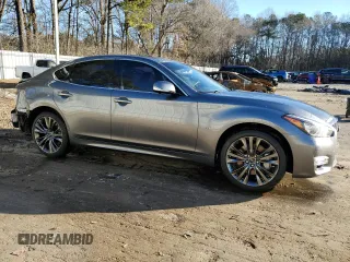 2019 Infiniti Q70 Luxe with VIN JN1BY1AR7KM580088, listed as a Copart auction lot 41612865 with 101,134 mi miles and Salvage title. Bid and sale history available at DreamBid. Image 4.