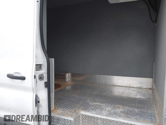 2022 Ford Transit Cargo with VIN 1FTBW3X83NKA44302, listed as a IAAI auction lot 41684165 with 33,463 mi miles and . Bid and sale history available at DreamBid. Image 8.