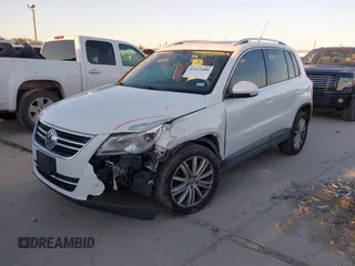 2010 Volkswagen Tiguan SEL with VIN WVGBV7AX4AW514362, listed as a IAAI auction lot 41413300 with 154,201 mi miles and . Bid and sale history available at DreamBid. Image 17.