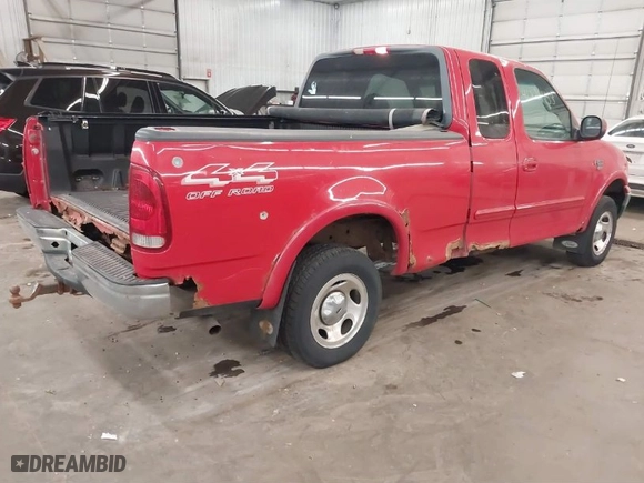 2000 Ford F-150 XL with VIN 1FTRX18L0YNA84231, listed as a IAAI auction lot 41824453 with 223,642 mi miles. Bid and sale history available at carsss.com. Image 4.