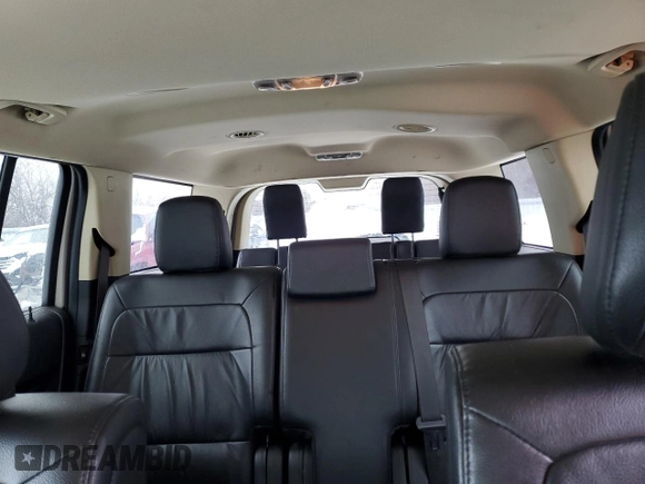 2014 Ford Flex SEL z VIN 2FMGK5C81EBD15219, wystawiony jako Copart lot #86478134 z przebiegiem 238 380 mil mil oraz Szkoda całkowita • Salvage title. Historia ofert i sprzedaży dostępna na DreamBid. Obrazek 10.