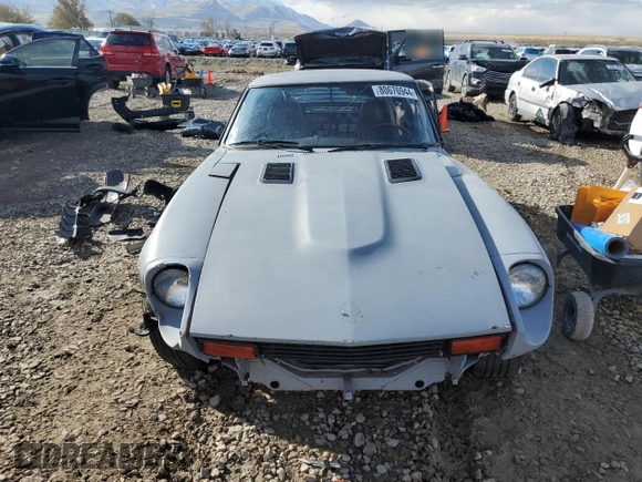 1978 Datsun 280ZX z VIN GHLS30122501, wystawiony jako Copart lot #80676944 z przebiegiem Nie podano mil oraz Szkody całkowita. Historia ofert i sprzedaży dostępna na DreamBid. Obrazek 5.