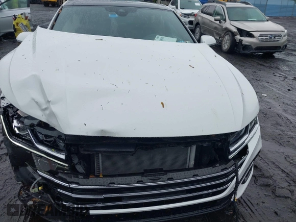 2023 Volkswagen Arteon SEL Premium R-Line z VIN WVWTR7AN4PE014292, wystawiony jako IAAI lot #42331800 z przebiegiem 6 389 mil mil oraz . Historia ofert i sprzedaży dostępna na DreamBid. Obrazek 6.