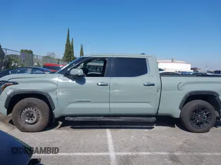 2022 Toyota Tundra Limited Hybrid with VIN 5TFJC5EC9NX001528, listed as a IAAI auction lot 41625774 with 57,475 mi miles and . Bid and sale history available at DreamBid. Image 6.