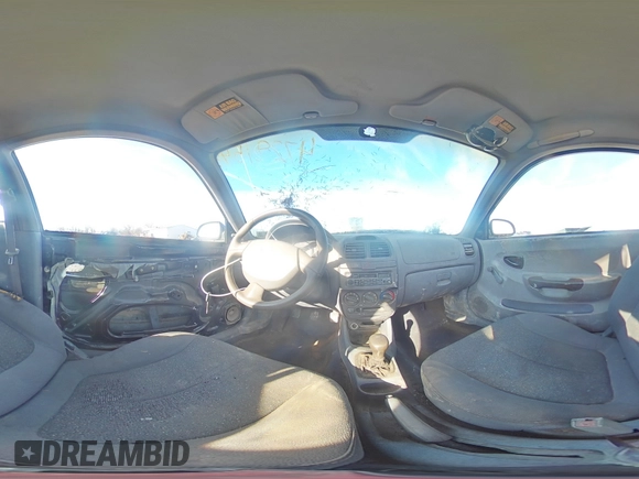 2002 Hyundai Accent z VIN KMHCF35G22U174792, wystawiony jako Copart lot #47281545 z przebiegiem 273 228 mil mil oraz Szkoda całkowita • Salvage title. Historia ofert i sprzedaży dostępna na DreamBid. Obrazek 13.