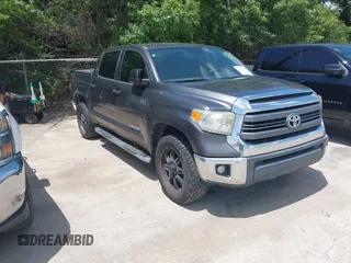 2014 Toyota Tundra SR5 with VIN 5TFEY5F14EX161476, listed as a IAAI auction lot 42742725 with 246,730 mi miles and . Bid and sale history available at DreamBid. Image 1.