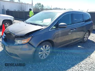 2014 Honda Odyssey EX-L with VIN 5FNRL5H61EB014695, listed as a IAAI auction lot 41694860 with 261,265 mi miles and . Bid and sale history available at DreamBid. Image 17.