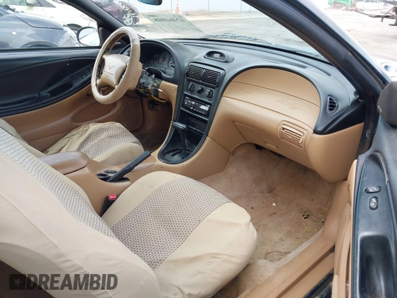 1996 Ford Mustang GT z VIN 1FALP42XXTF137304, wystawiony jako IAAI lot #42464808 z przebiegiem 166 565 mil mil oraz . Historia ofert i sprzedaży dostępna na DreamBid. Obrazek 5.