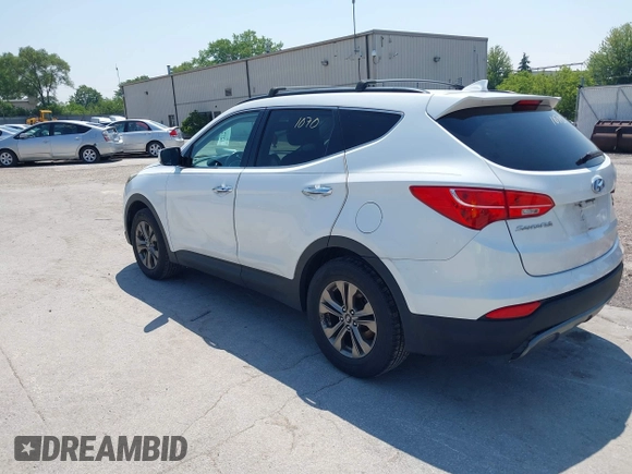 2014 Hyundai Santa Fe with VIN 5XYZUDLB9EG156555, listed as a IAAI auction lot 42721070 with 349,412 mi miles and . Bid and sale history available at DreamBid. Image 3.