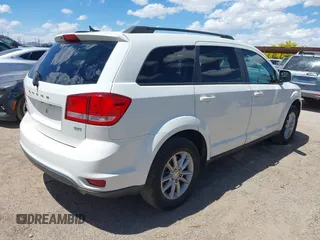 2017 Dodge Journey SXT z VIN 3C4PDDBG7HT512776, wystawiony jako IAAI lot #41967109 z przebiegiem 109 747 mil mil oraz . Historia ofert i sprzedaży dostępna na DreamBid. Obrazek 4.