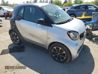 2016 Smart fortwo Passion with VIN WMEFJ5DA2GK069795, listed as a Copart auction lot 55079085 with 153,339 mi miles and Clean Title. Bid and sale history available at DreamBid. Image 4.
