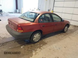 1996 Saturn SL with VIN 1G8ZG528XTZ192914, listed as a IAAI auction lot 41604499 with 126,180 mi miles. Bid and sale history available at carsss.com. Image 4.