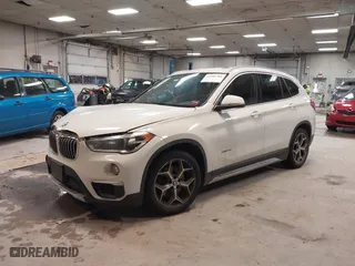 2016 BMW X1 xDrive28i with VIN WBXHT3C30G5E52065, listed as a IAAI auction lot 41552781 with 205,961 mi miles. Bid and sale history available at carsss.com. Image 16.