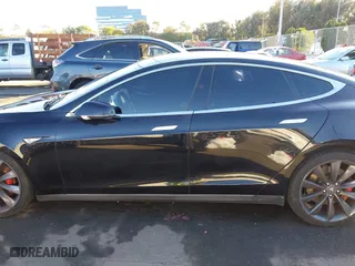 2015 Tesla Model S 85D with VIN 5YJSA1H46FF096603, listed as a IAAI auction lot 41084296 with 114,466 mi miles. Bid and sale history available at carsss.com. Image 14.