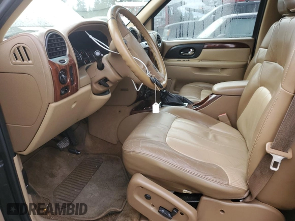 2003 GMC Envoy XL SLT with VIN 1GKES16S036191987, listed as a Copart auction lot 76776604 with 253,889 mi miles and Salvage Title. Bid and sale history available at carsss.com. Image 7.