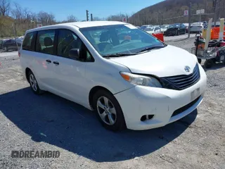 2015 Toyota Sienna L with VIN 5TDZK3DC3FS690484, listed as a IAAI auction lot 41888073 with 201,518 mi miles. Bid and sale history available at carsss.com. Image 1.