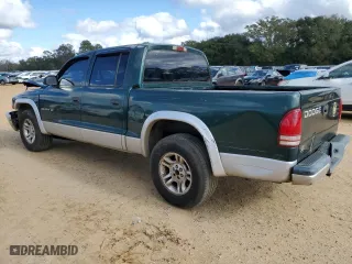 2002 Dodge Dakota SLT with VIN 1B7HL48N92S556512, listed as a Copart auction lot 83492024 with 272,649 mi miles and Salvage Title. Bid and sale history available at carsss.com. Image 2.