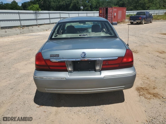 2005 Mercury Grand Marquis GS with VIN 2MEFM74W15X663557, listed as a Copart auction lot 65799904 with 107,483 mi miles and Salvage Title. Bid and sale history available at carsss.com. Image 6.