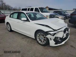 2017 BMW 3 Series 320i xDrive with VIN WBA8E5G57HNU22247, listed as a Copart auction lot 49698215 with Not provided miles and Salvage title. Bid and sale history available at DreamBid. Image 4.