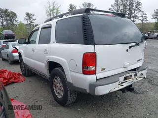 2004 Chevrolet Tahoe LS with VIN 1GNEK13ZX4R308382, listed as a IAAI auction lot 41901448 with 205,922 mi miles. Bid and sale history available at carsss.com. Image 3.