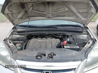 2007 Honda Odyssey LX z VIN 5FNRL38297B073742, wystawiony jako IAAI lot #41919129 z przebiegiem 152 584 mil mil oraz . Historia ofert i sprzedaży dostępna na DreamBid. Obrazek 10.