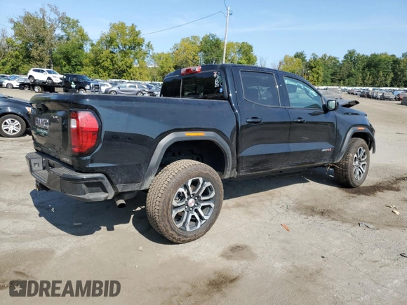 2024 GMC Canyon 4WD AT4 with VIN 1GTP6DEK2R1180037, listed as a Copart auction lot 71637264 with 7,565 mi miles and Salvage Title. Bid and sale history available at carsss.com. Image 3.