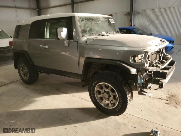 2012 Toyota FJ Cruiser with VIN JTEBU4BF9CK129302, listed as a Copart auction lot 84932364 with 127,851 mi miles and Salvage Title. Bid and sale history available at carsss.com. Image 4.