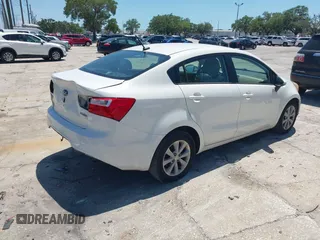 2013 Kia Rio SX with VIN KNADN4A33D6174454, listed as a IAAI auction lot 42032612 with 157,199 mi miles. Bid and sale history available at carsss.com. Image 4.