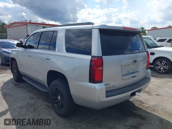 2018 Chevrolet Tahoe LT with VIN 1GNSCBKCXJR367852, listed as a IAAI auction lot 41549304 with 151,684 mi miles and . Bid and sale history available at DreamBid. Image 3.