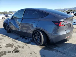 2023 Tesla Model Y Long Range with VIN 7SAYGDEE2PA047794, listed as a Copart auction lot 48397305 with 18,850 mi miles and Salvage Title. Bid and sale history available at DreamBid. Image 2.