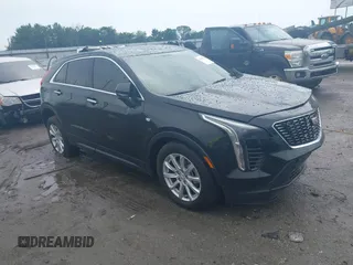 2023 Cadillac XT4 AWD Luxury z VIN 1GYFZBR40PF200976, wystawiony jako IAAI lot #39503922 z przebiegiem 9 403 mil mil oraz . Historia ofert i sprzedaży dostępna na DreamBid. Obrazek 1.