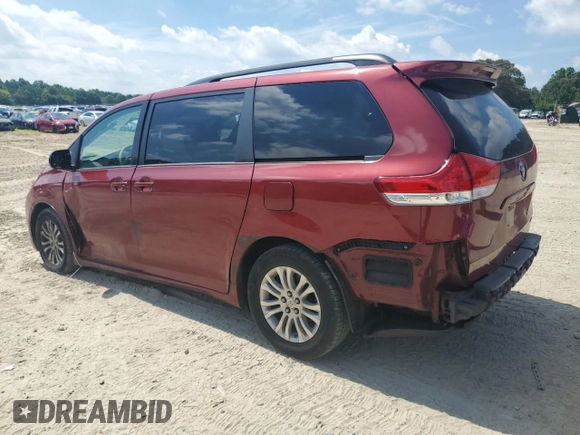 2012 Toyota Sienna XLE AAS z VIN 5TDYK3DC9CS243892, wystawiony jako Copart lot #61198555 z przebiegiem 129 061 mil mil oraz Nie do naprawy • Non repairable. Historia ofert i sprzedaży dostępna na DreamBid. Obrazek 2.