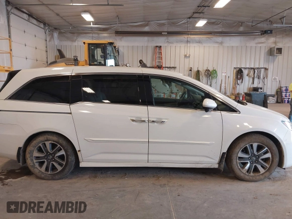 2015 Honda Odyssey Touring Elite with VIN 5FNRL5H97FB060060, listed as a IAAI auction lot 41829864 with Not Provided miles and . Bid and sale history available at DreamBid. Image 12.