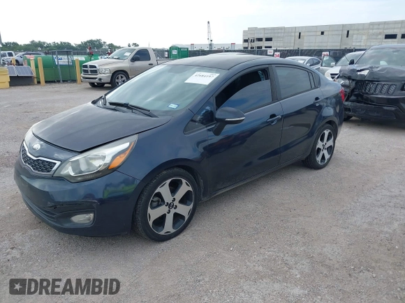 2013 Kia Rio EX with VIN KNADN4A39D6271075, listed as a IAAI auction lot 42684197 with 136,099 mi miles and . Bid and sale history available at DreamBid. Image 2.