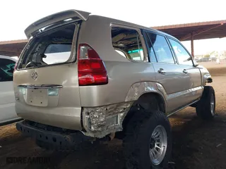 2008 Lexus GX 470 with VIN JTJBT20X580149408, listed as a IAAI auction lot 41589652 with 212,443 mi miles. Bid and sale history available at carsss.com. Image 4.