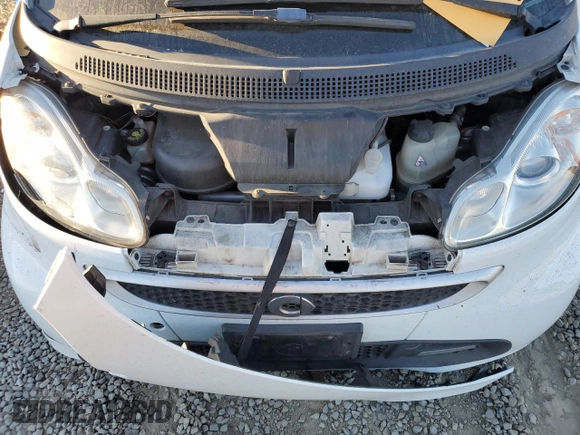 2013 Smart fortwo Passion z VIN WMEEK3BA3DK661248, wystawiony jako Copart lot #81115694 z przebiegiem 112 817 mil mil oraz Szkoda całkowita • Salvage title. Historia ofert i sprzedaży dostępna na DreamBid. Obrazek 11.