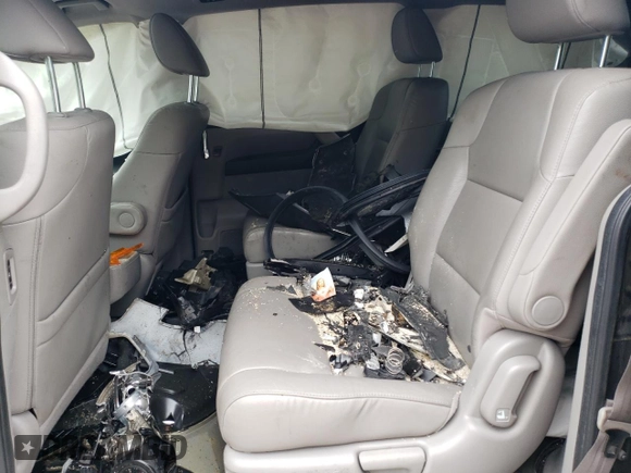 2014 Honda Odyssey EX-L with VIN 5FNRL5H69EB125480, listed as a Copart auction lot 59988475 with Not provided miles and Salvage title. Bid and sale history available at DreamBid. Image 11.